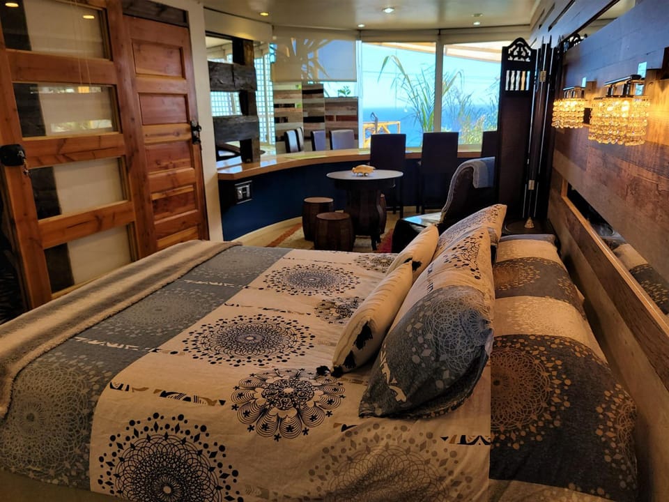 Bed, Seating area, Bedroom, Sea view
