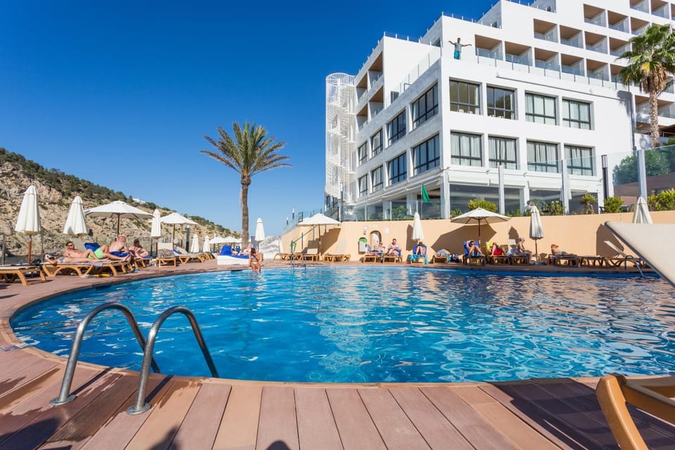 Property building, People, Swimming pool, Swimming pool