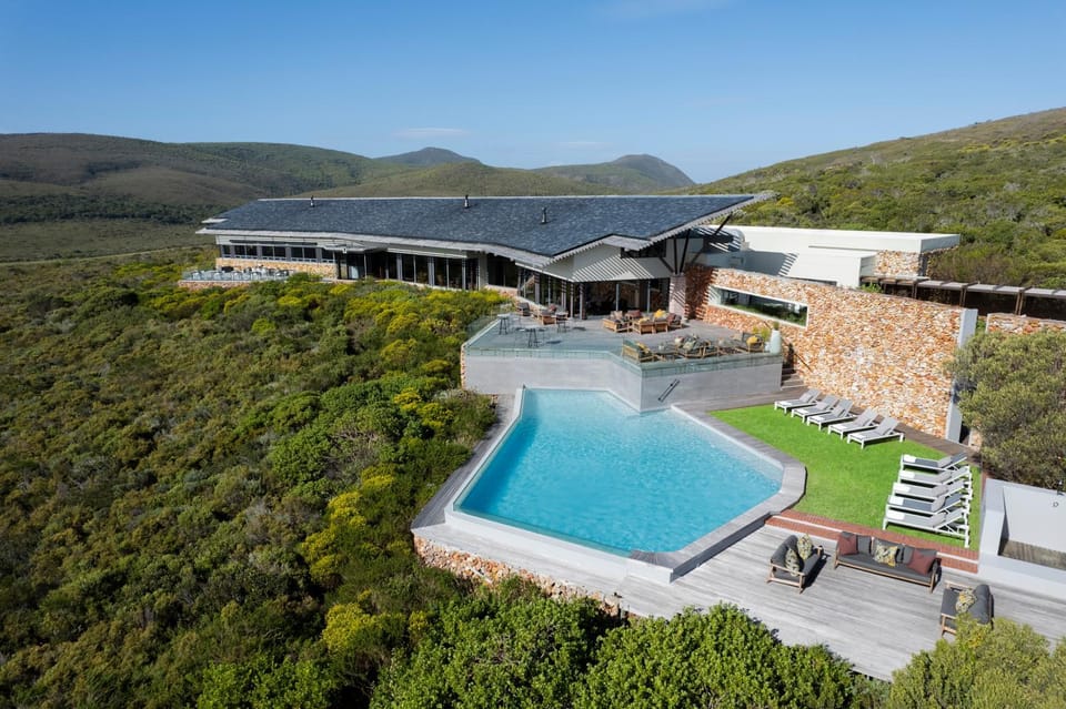 Property building, Day, Natural landscape, Pool view, Swimming pool, sunbed