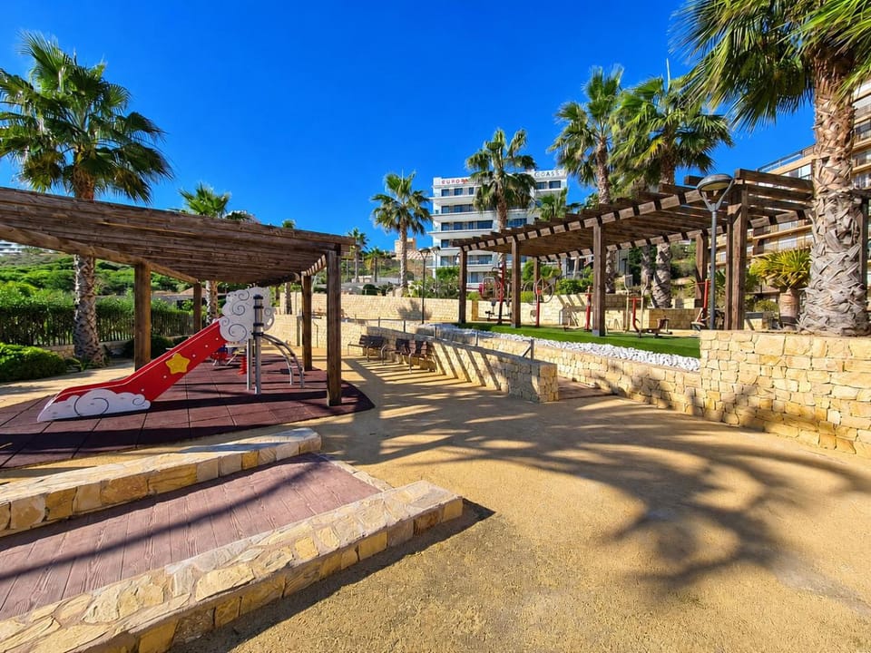 Property building, Children play ground, Garden view