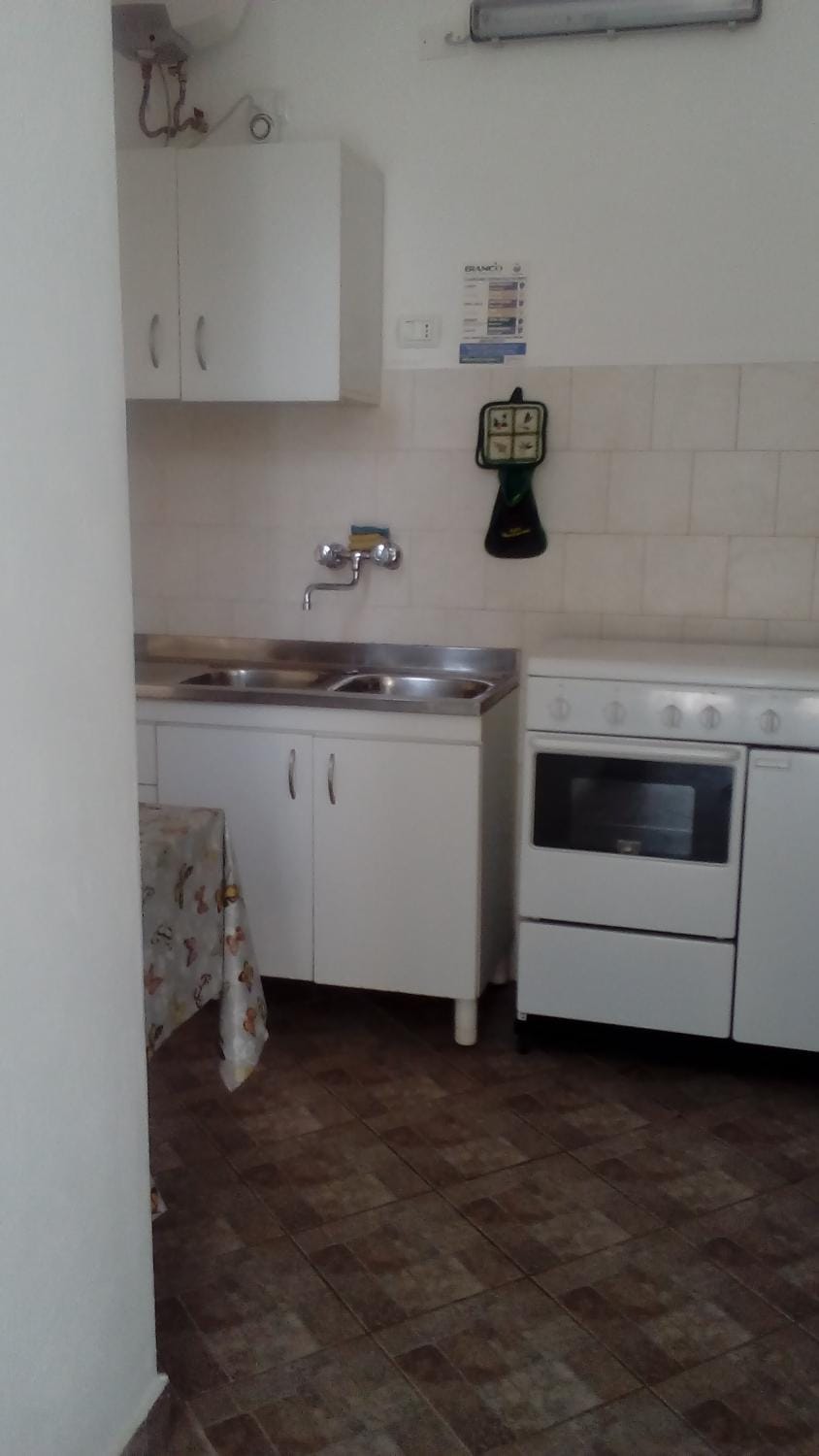 Kitchen or kitchenette, oven