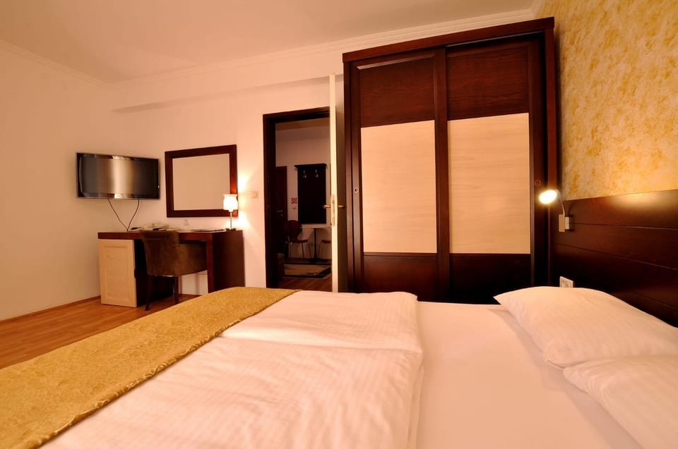 Bed, hair dresser, wardrobe