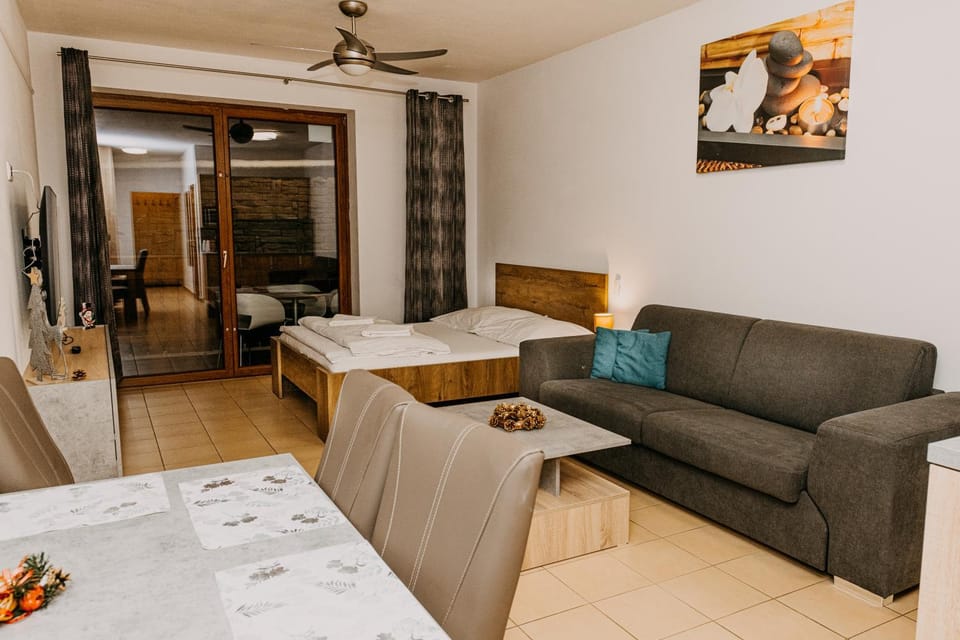 Bed, Living room, Seating area, Bedroom