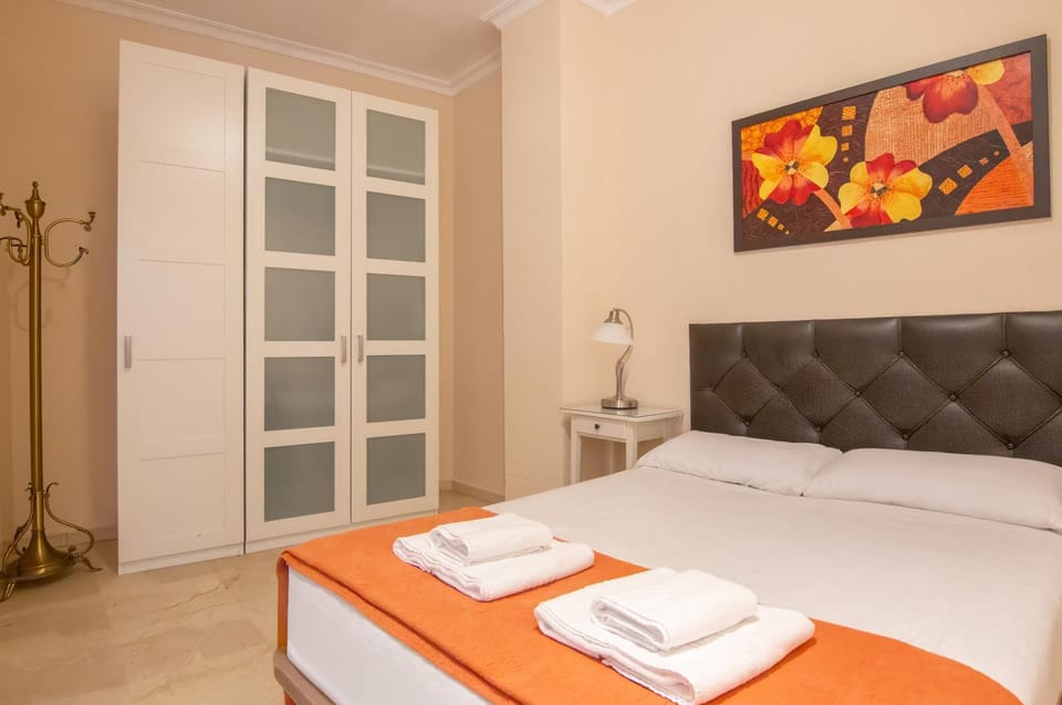Bed, Photo of the whole room, Bedroom, towels, wardrobe