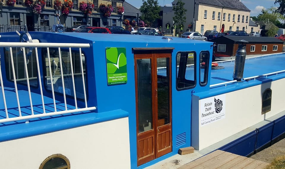 Roisin Dubh Houseboat Docked boat in Ireland