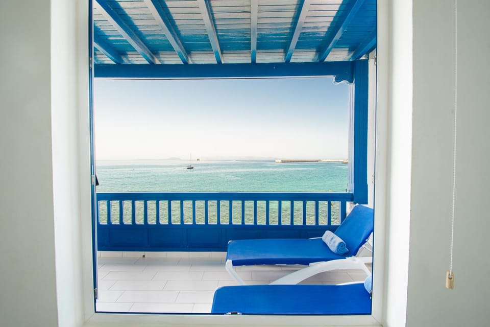 Natural landscape, Solarium, View (from property/room), Balcony/Terrace, Beach, Landmark view, Sea view, sunbed, towels