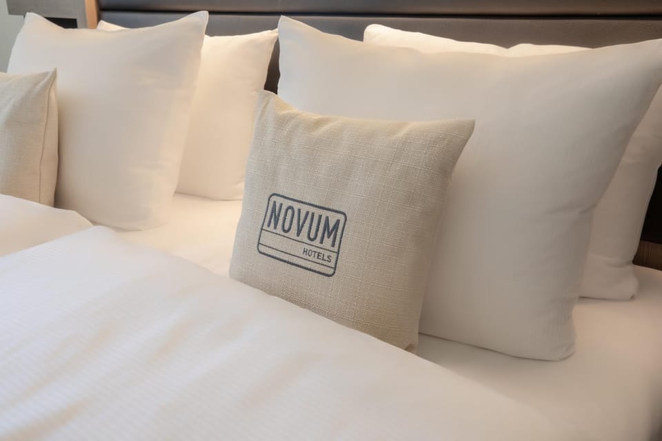 Bed, Property logo or sign, Bedroom