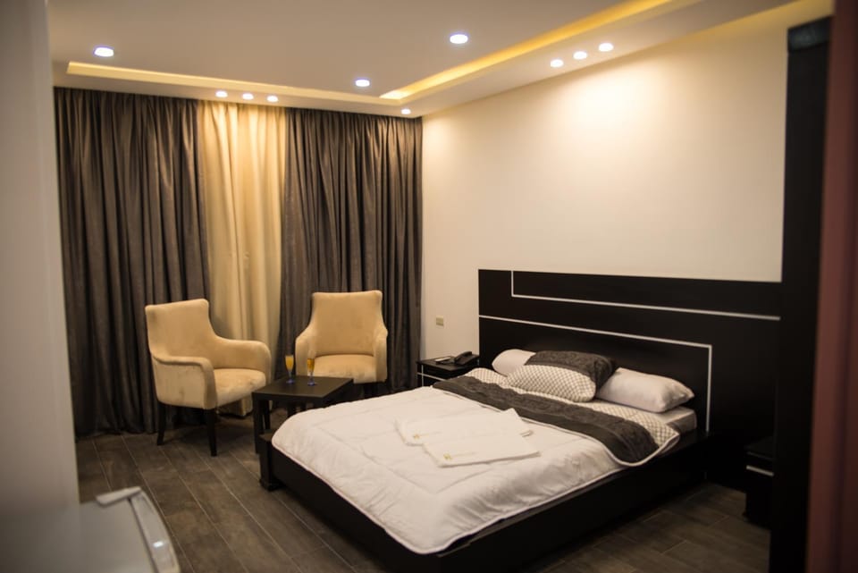 Bed, Seating area, Bedroom