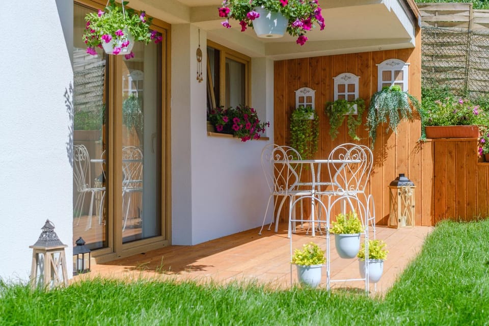 Property building, Patio, Facade/entrance, Spring, Day, Garden, View (from property/room), Balcony/Terrace, Balcony/Terrace, Garden view