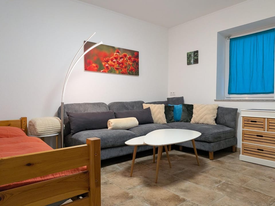 Bed, Living room, Seating area, Bedroom