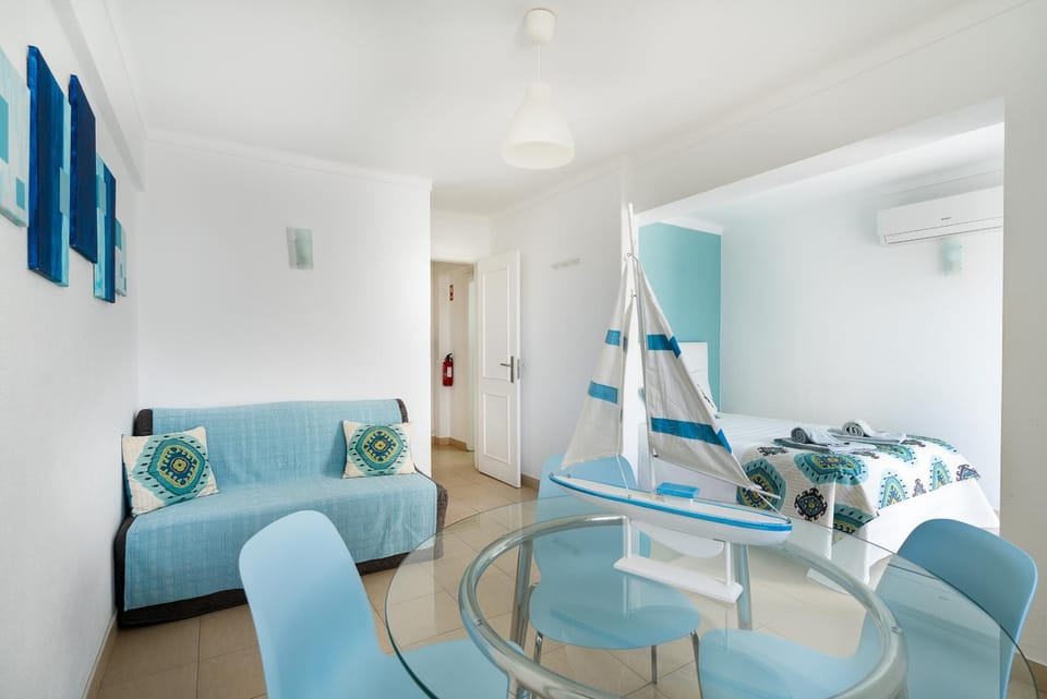 Bed, Living room, Dining area