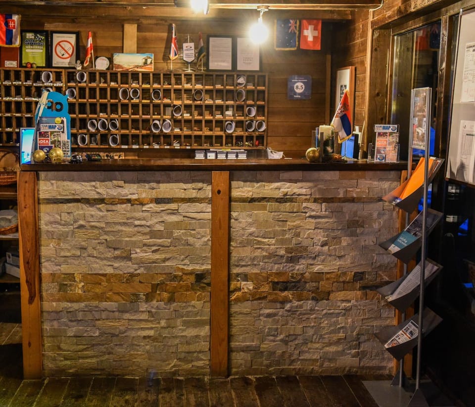 Staff, Communal lounge/ TV room, Property logo or sign, Lobby or reception, Lounge or bar, Food and drinks, Logo/Certificate/Sign, Pets, Garden view, Mountain view, Street view, Drinks, Alcoholic drinks, Non alcoholic drinks, Certificate/Award, Family