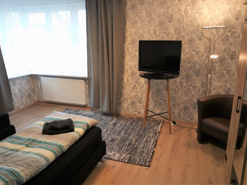 Communal lounge/ TV room, Bed, Living room, Bedroom