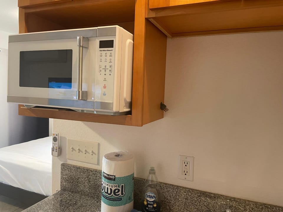 Kitchen or kitchenette, microwave
