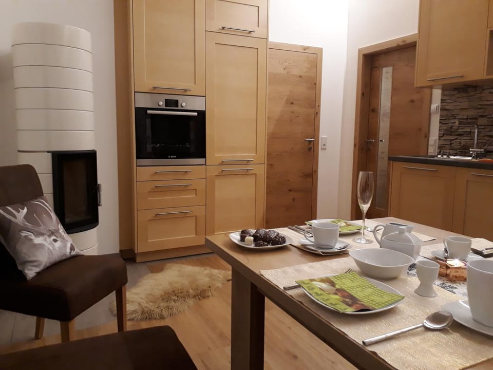 Living room, fireplace, kitchen
