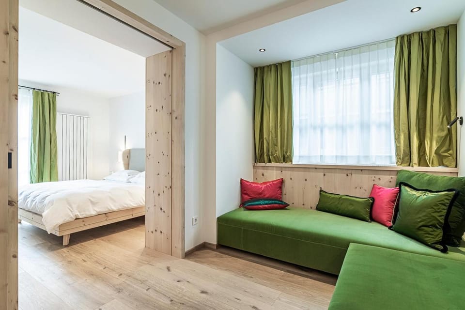 Bed, Living room, Seating area, Bedroom