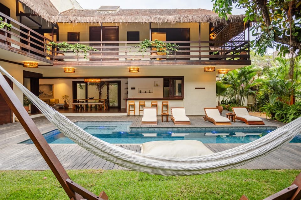 Property building, Patio, Spring, Day, Natural landscape, Garden, Living room, Seating area, Garden view, Pool view, Swimming pool, sunbed