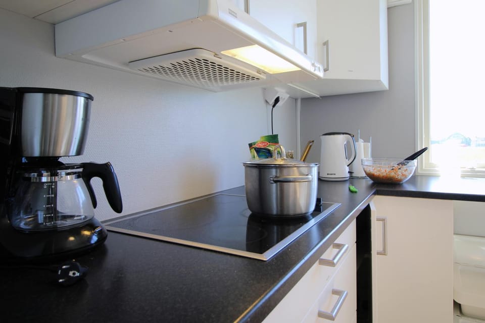Kitchen or kitchenette, stove, toaster