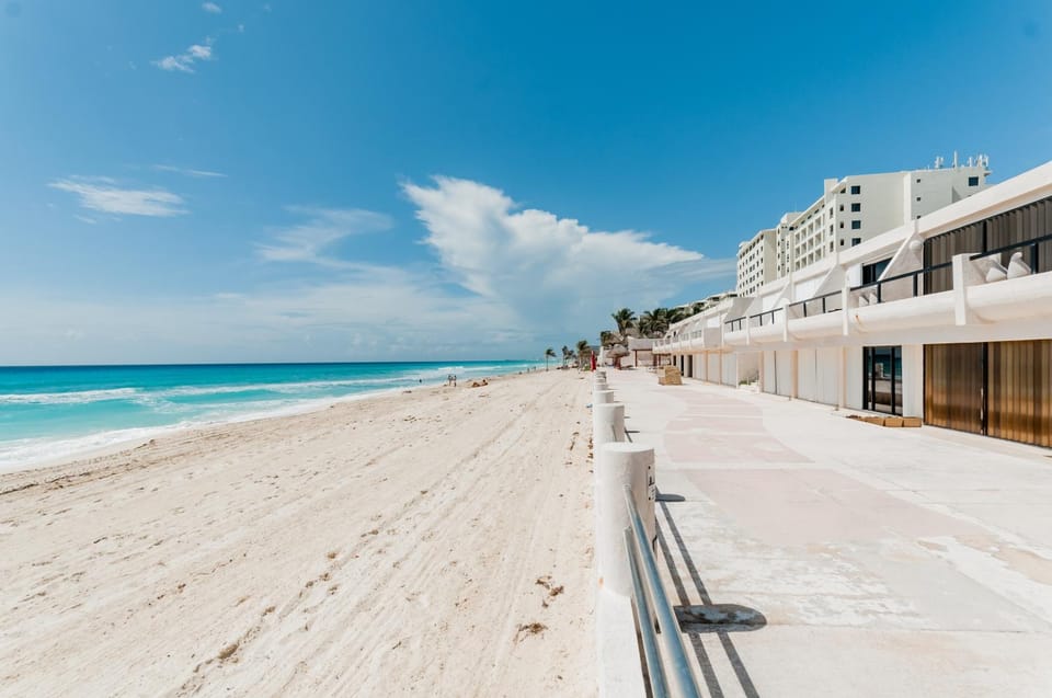 Property building, Nearby landmark, Day, Natural landscape, Beach, Sea view