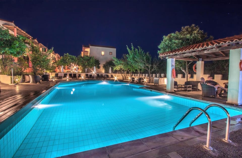 Property building, Night, Pool view, Swimming pool, sunbed