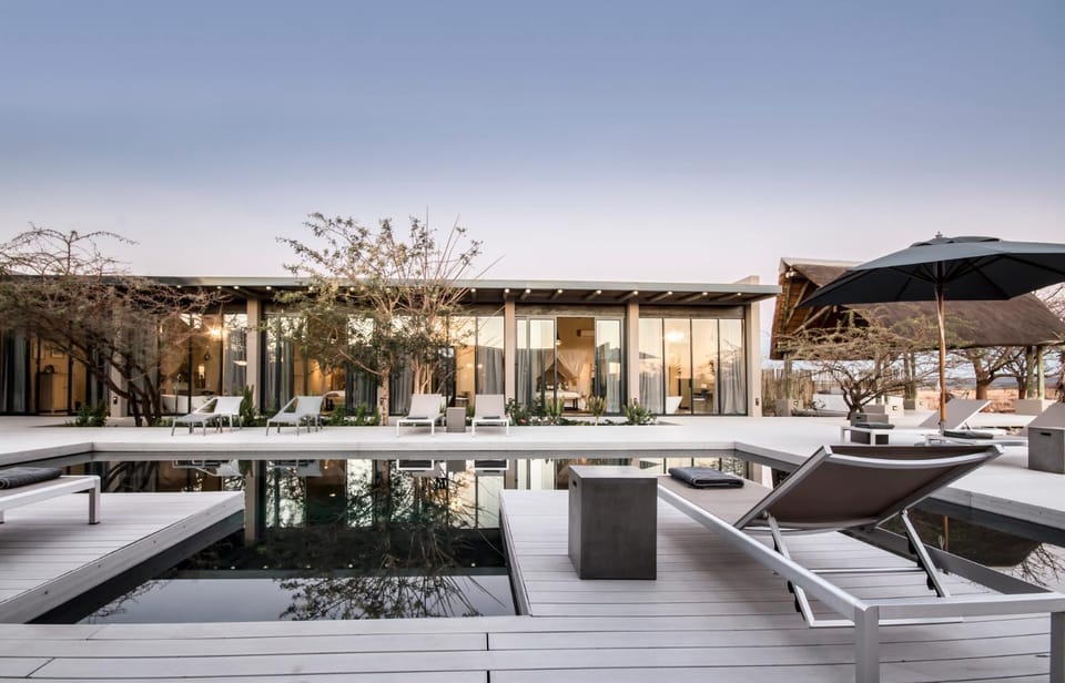 Property building, Decorative detail, Swimming pool, Sunset