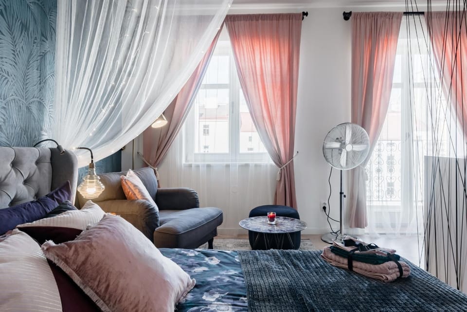 Bed, Living room, Seating area, Bedroom