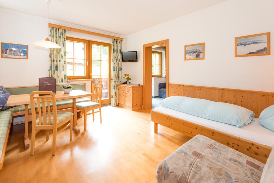 Bed, Living room, Seating area