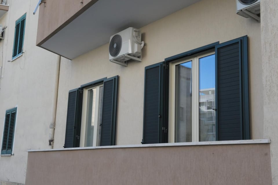 Property building, air conditioner
