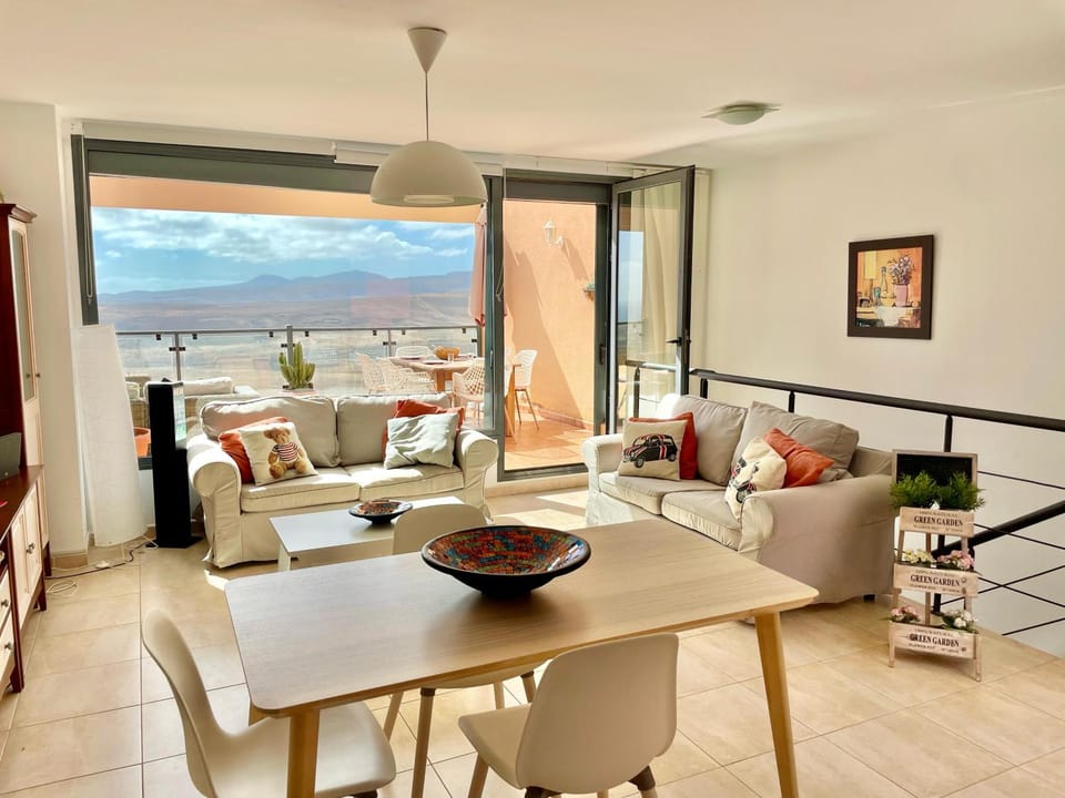 Communal lounge/ TV room, View (from property/room), Living room, Lounge or bar, Seating area, Dining area, Landmark view, Mountain view, Sea view