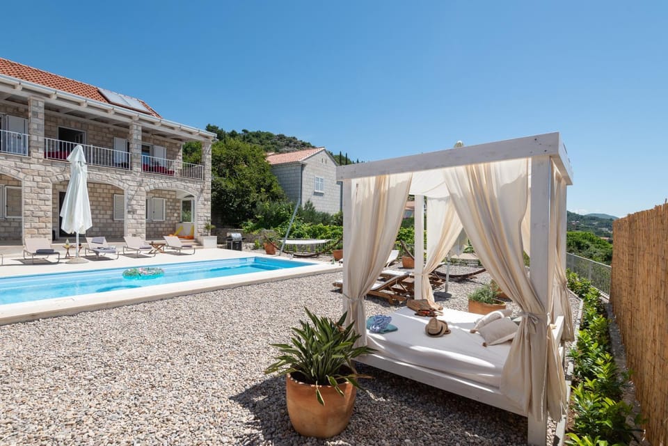 Property building, Patio, Swimming pool, sunbed