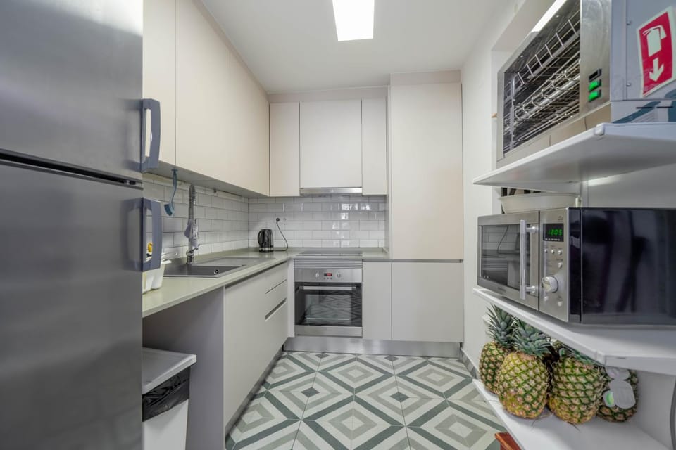Kitchen or kitchenette, oven, stove