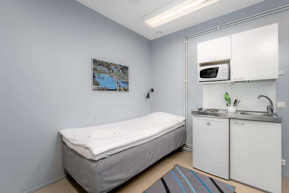 Bed, Kitchen or kitchenette, Bedroom, microwave, towels
