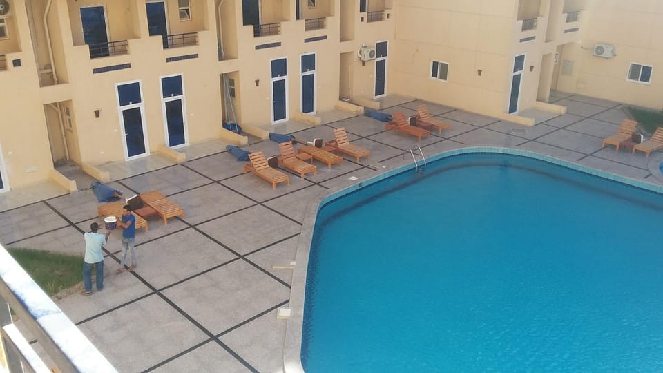 Swimming pool, sunbed