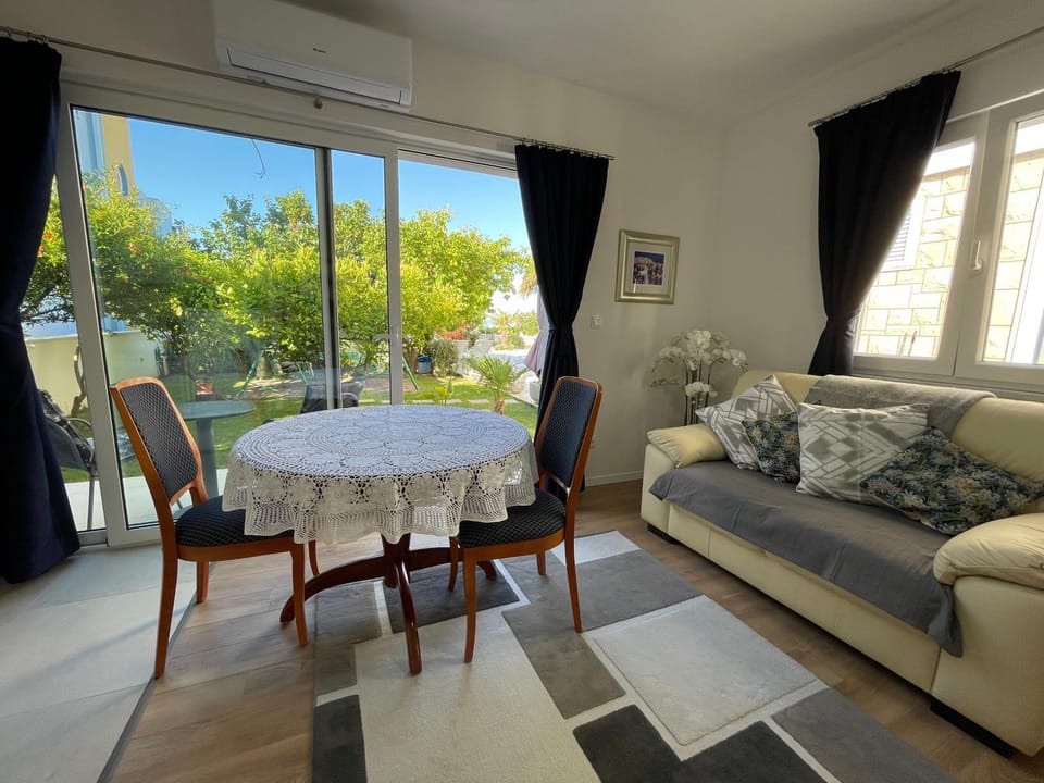 Patio, Balcony/Terrace, Living room, Seating area, Garden view, Garden view, Pool view, Sea view