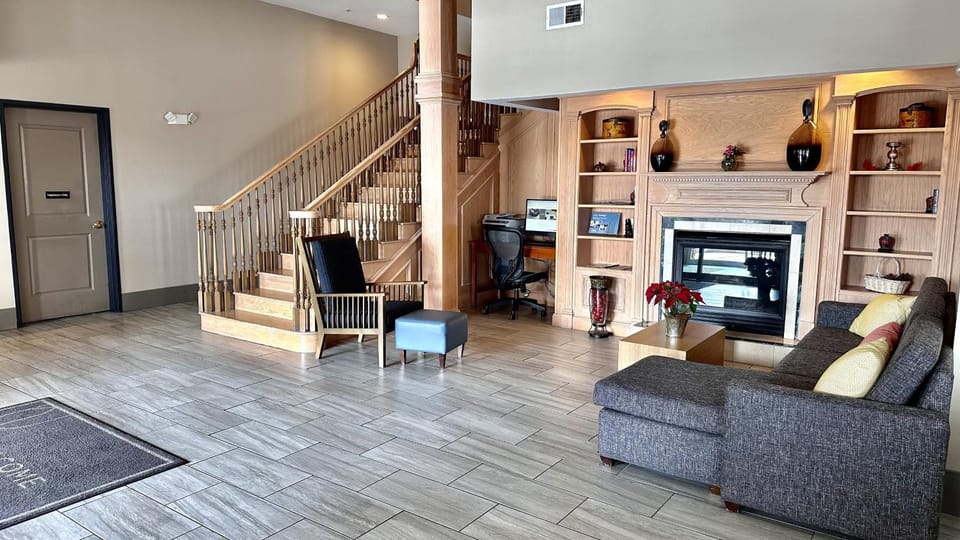 Property building, Living room, Seating area, flat iron