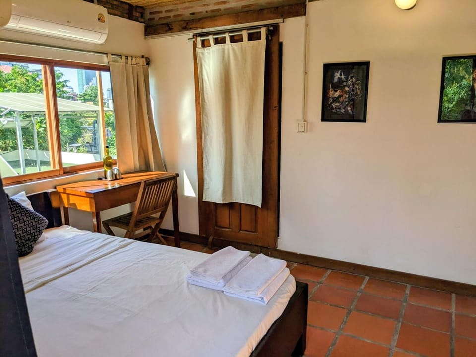 Bed, Photo of the whole room, Bedroom, towels, air conditioner