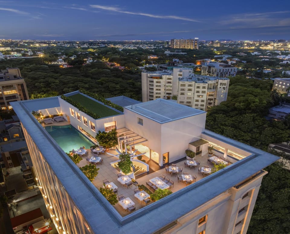 Property building, Night, Bird's eye view, View (from property/room), City view, Pool view, Swimming pool