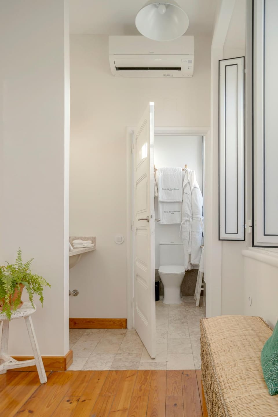 Bathroom, towels, air conditioner