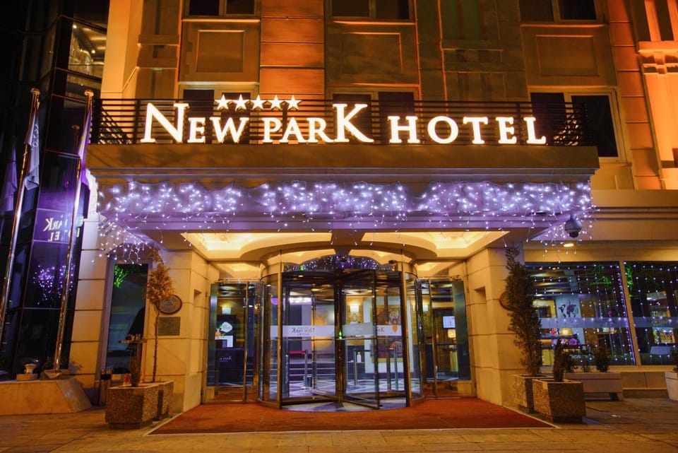 Property building, Facade/entrance, Night, Property logo or sign, Logo/Certificate/Sign