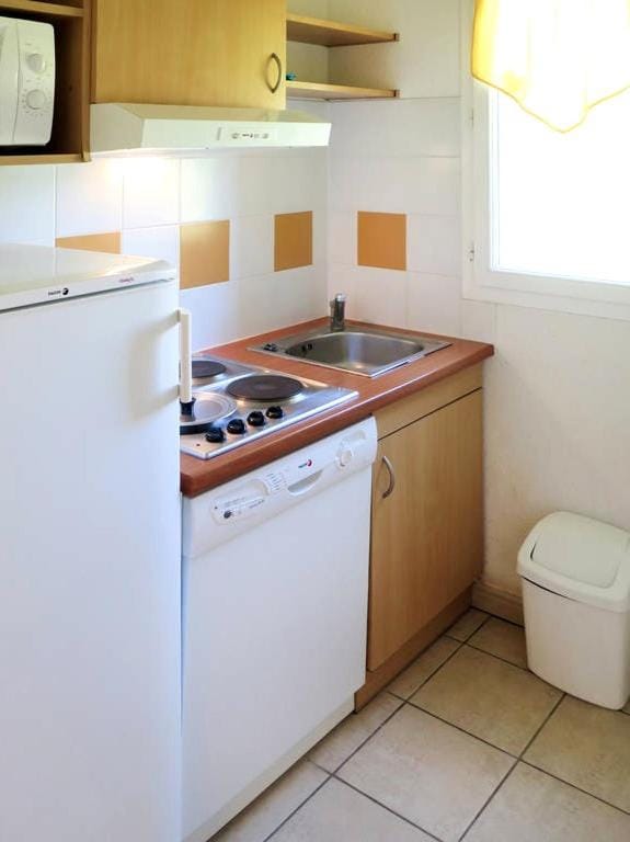 Kitchen or kitchenette, stove