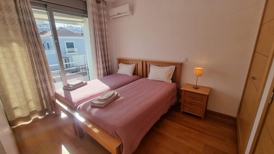 Bed, Photo of the whole room, Bedroom, towels, air conditioner