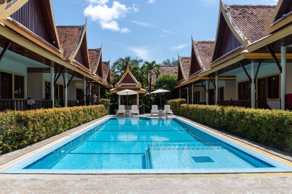 Property building, Day, Pool view, Swimming pool, sunbed