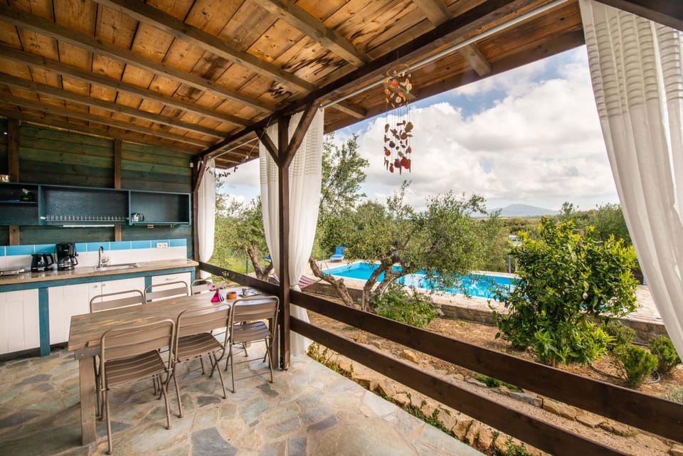 Property building, View (from property/room), Balcony/Terrace, Dining area, Garden view, Pool view, kitchen