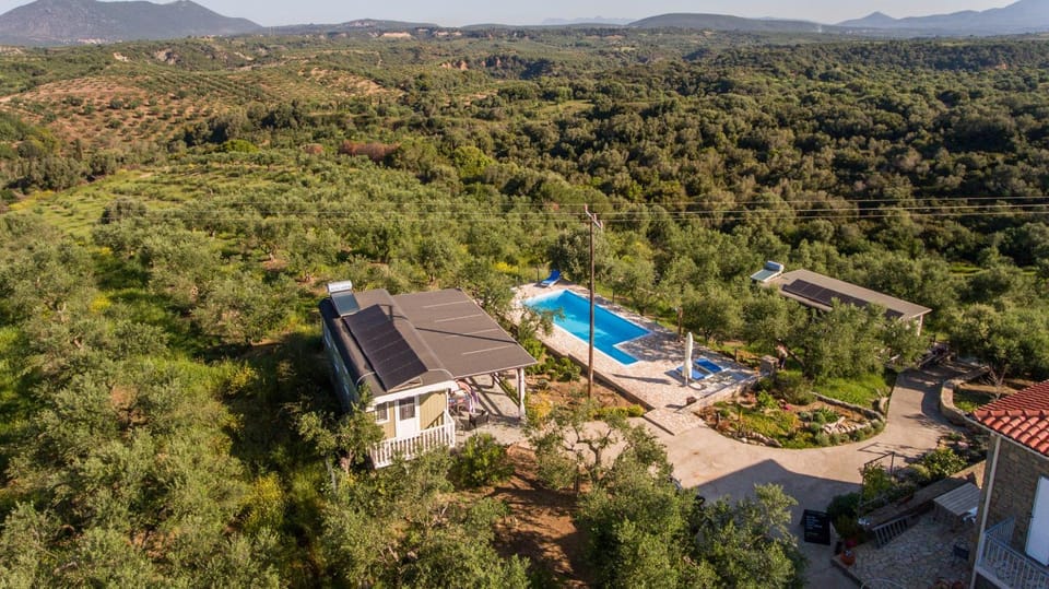 Property building, Natural landscape, Bird's eye view, Mountain view, Swimming pool