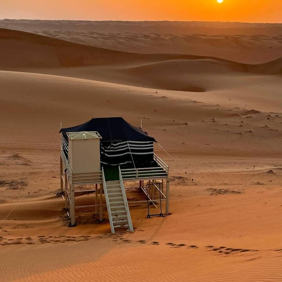 Oman desert private camp Luxury tent in Oman