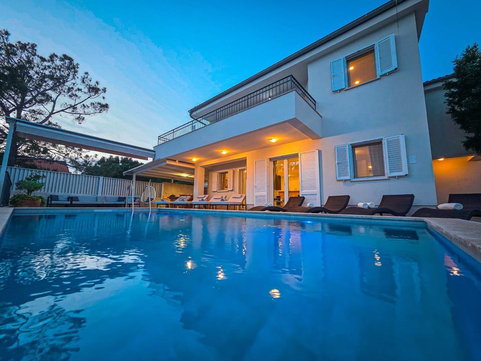 Property building, Patio, Day, Night, Seating area, Dining area, Pool view, Swimming pool, sunbed