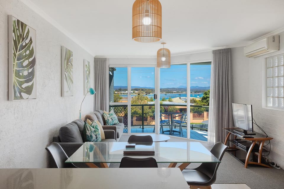 View (from property/room), Living room, Seating area, Dining area, Lake view, Sea view