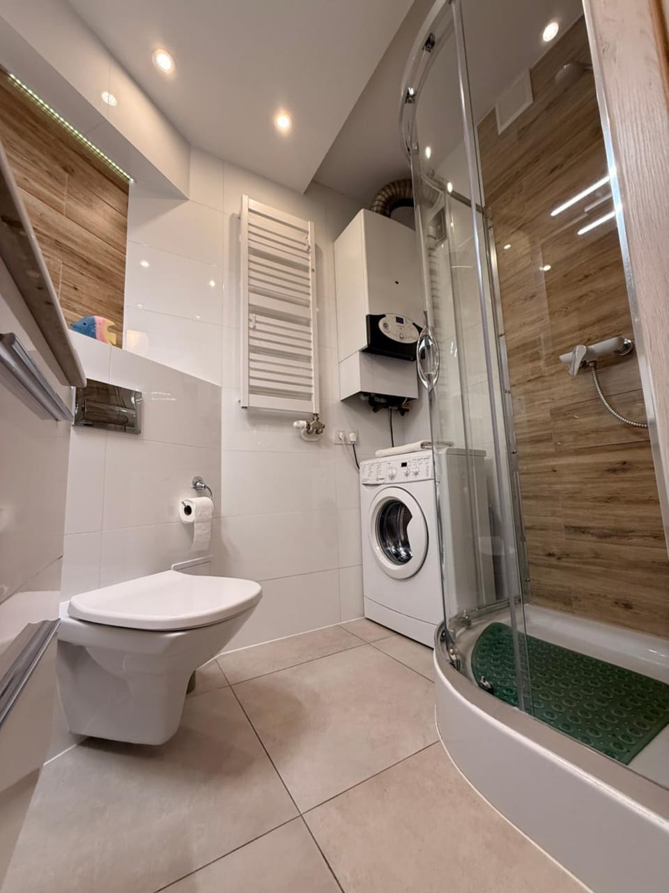 Shower, Toilet, Bathroom, towels, washing machine, dryer