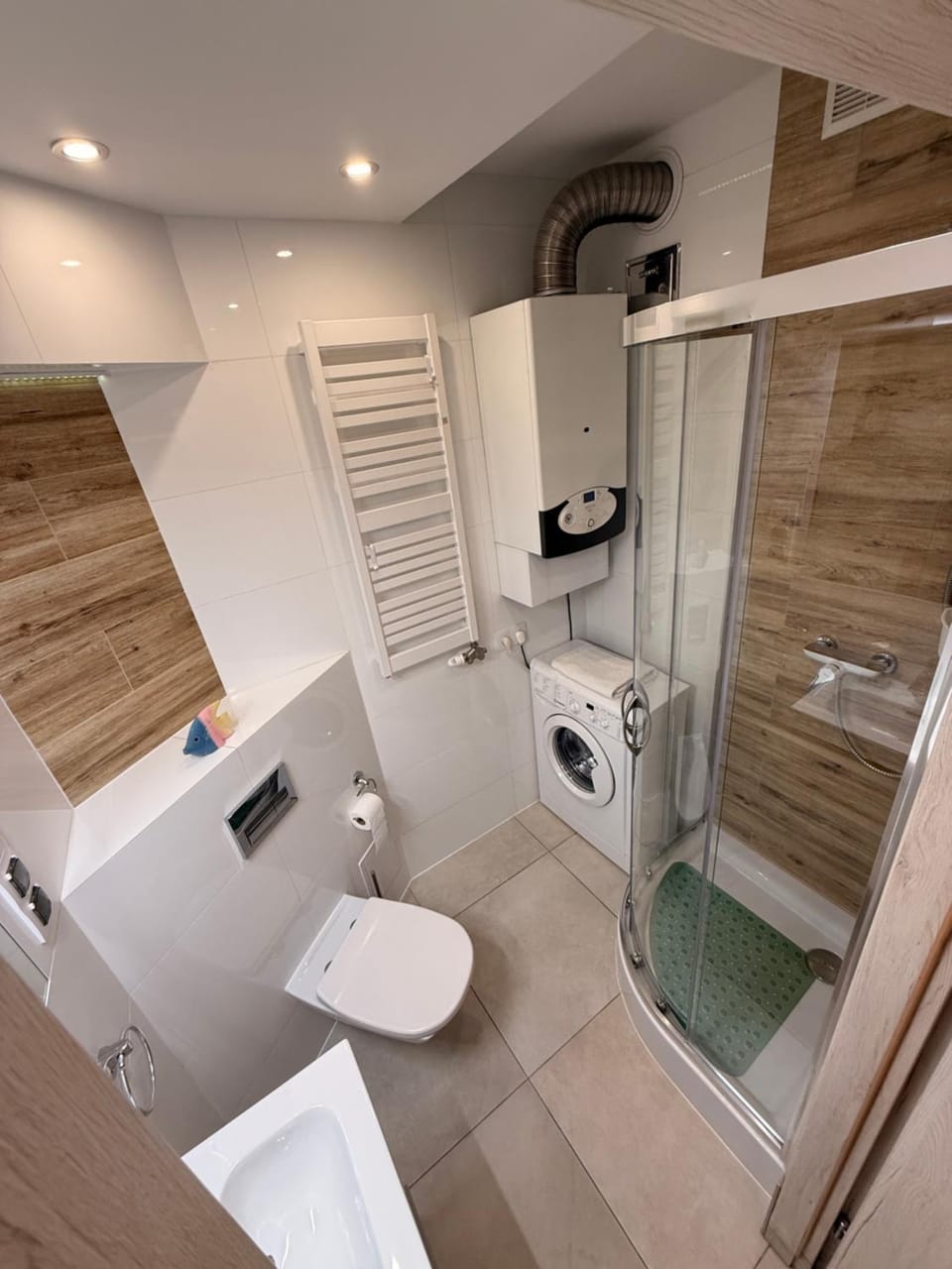 Shower, Toilet, Bathroom, towels, washing machine, dryer