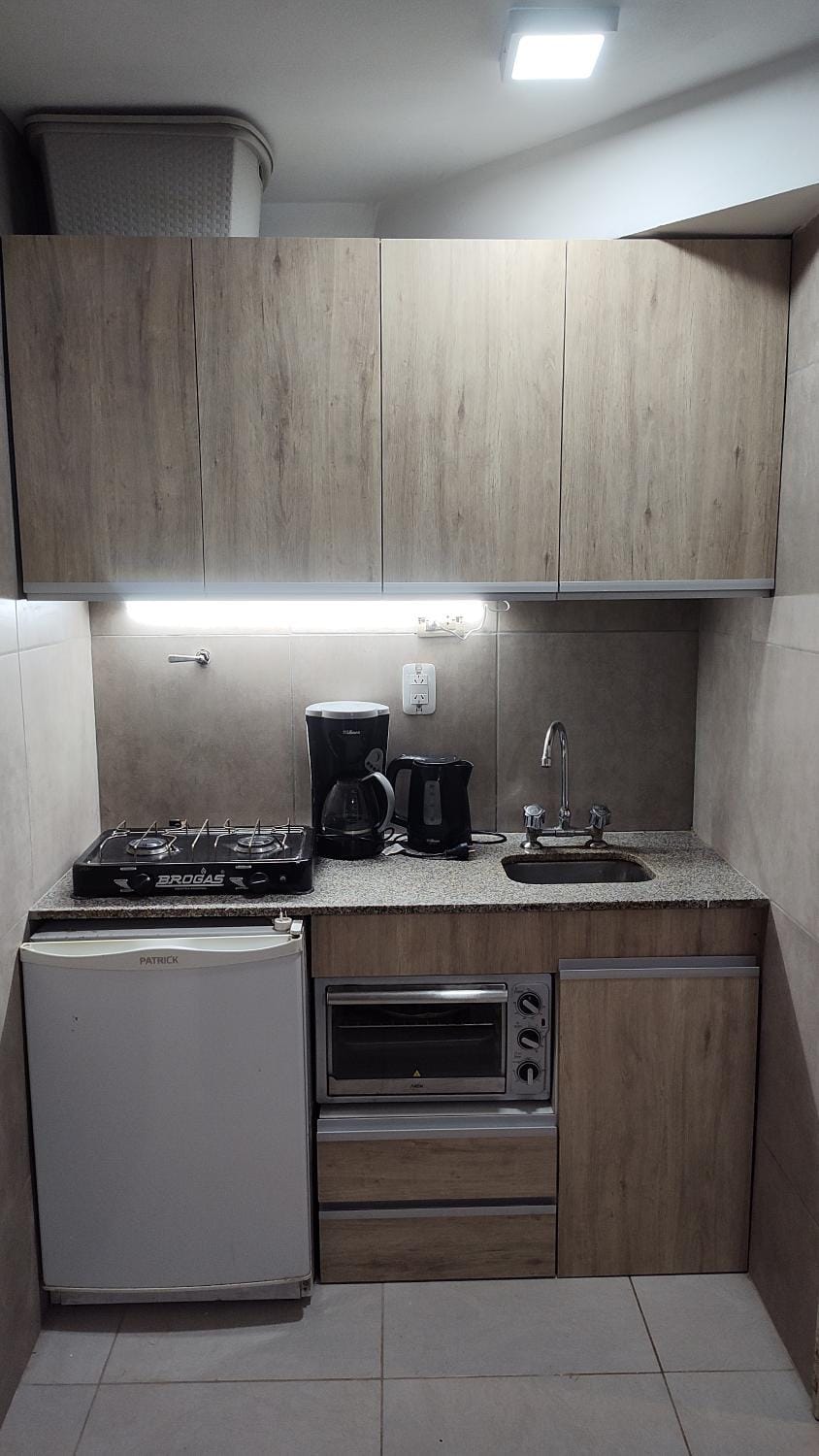 Kitchen or kitchenette, oven, stove